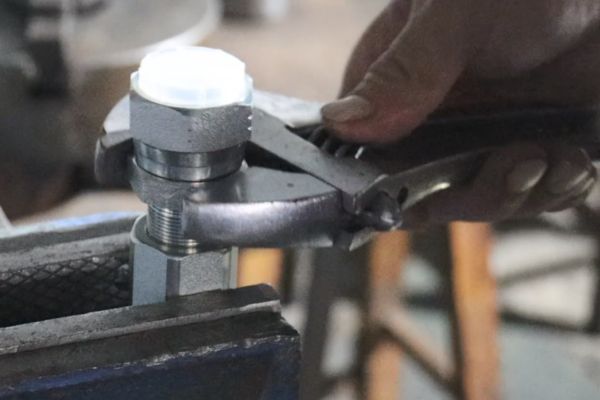 install Reusable Fitting with wrench